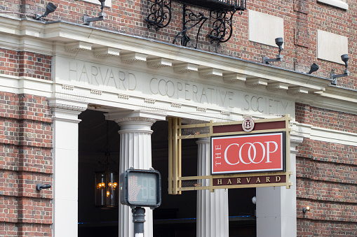 Cambridge, MA, USA - June 29, 2022: Harvard Cooperative Society (the Coop), a collegiate bookstore founded by Harvard students in 1882, on the Harvard University campus in Cambridge, Massachusetts.