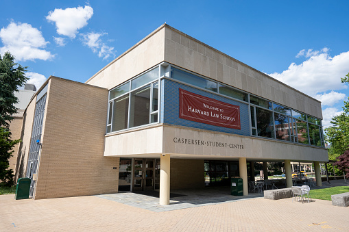 Cambridge, MA, USA - June 29, 2022: Welcome to Harvard Law School (HLS) banner is seen at the Caspersen Student Center on the Harvard University campus in Cambridge, Massachusetts.