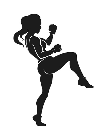 Stylized silhouette of a young athletic woman kickboxer wearing red boxing gloves and sports shoes is exercising in defensive position, kicking with the leg - cut out vector icon, sticker or decal