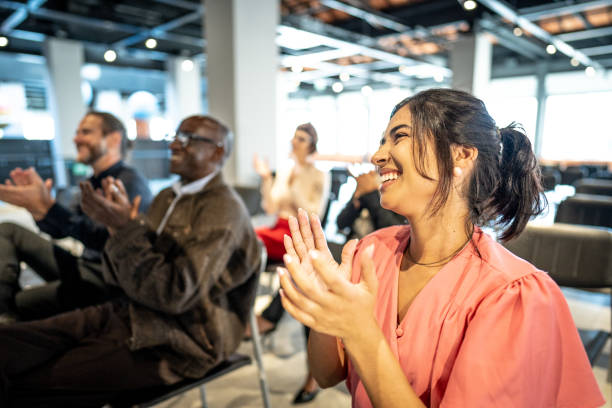 istock Group of people clapping in a seminar 1497998780