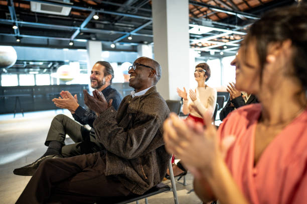 istock Group of people clapping in a seminar 1497998781