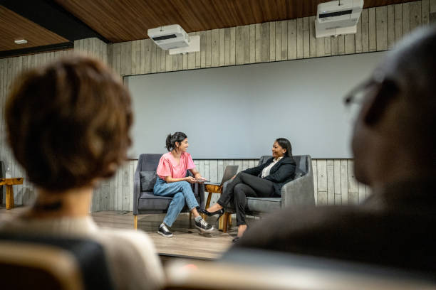 istock Young woman interviewing a woman at studio 1497998799