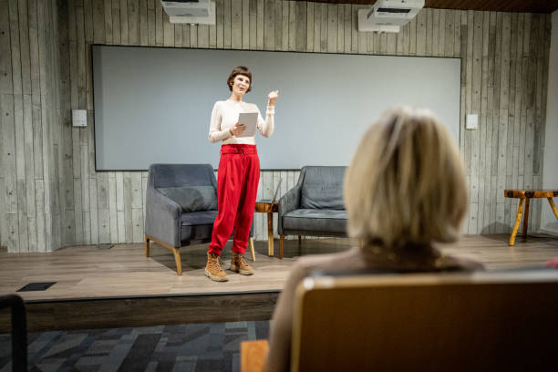 istock Mature woman talking with spectators in a seminar 1497998802