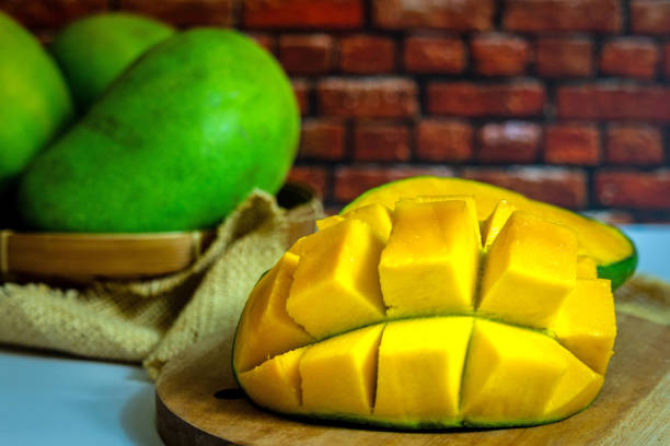 istock Fresh mango slices. Healthy food. Selective focus 1498000266