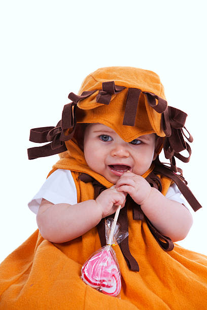 istock Baby with a lion mask 149800085