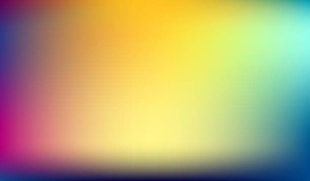 istock neon color gradation background with yellow, purple, and blue color combination. 1498001782
