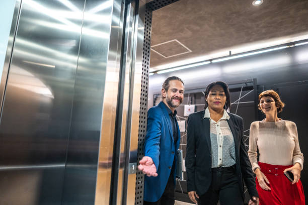istock Business person entering at the elevator 1498006349