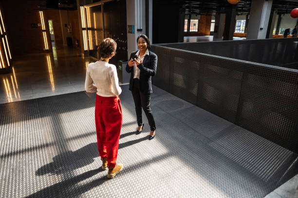 Business person talking at office lobby