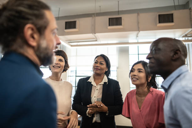 istock Coworkers talking on a meeting at office 1498006536