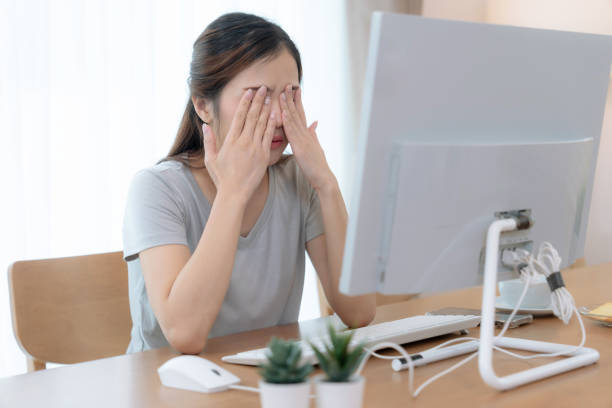 istock Asian woman working from home, She was tired and stressed. 1498006608