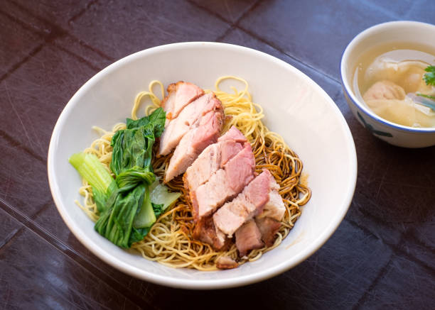 istock Wonton dried noodles with roasted pork. 1498007001