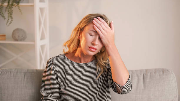 istock Exhausted day suffering woman headache frustration 1498010833