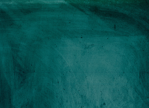 Dust scratches. Weathered overlay. Old film noise. Teal green black smeared dirt stains texture on dark worn grunge illustration abstract background.