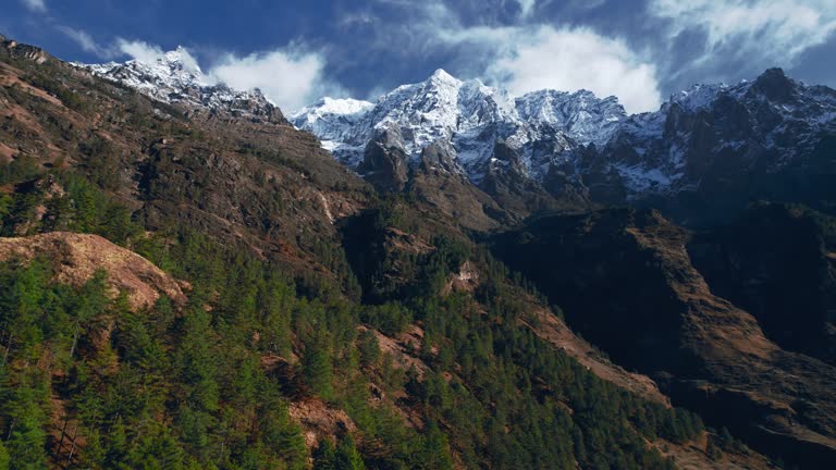 The rocky snow-capped mountains