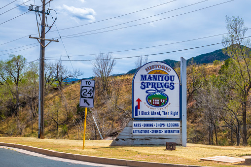 Manitou Springs, CO, USA - May 7, 2022: A welcoming signboard at the entry point of the place