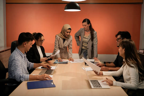 istock A team of business people are stressed about problems working at the office. 1498033593