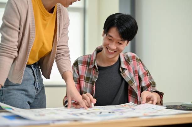istock A male developer enjoys brainstorming on a new prototype for a new app with a female colleague 1498038890
