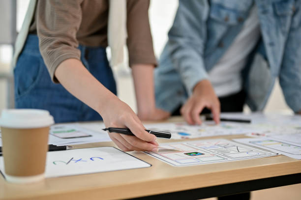 istock An app developer team is in the meeting, checking a new app prototype together. 1498038898