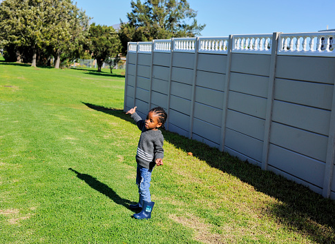 black African boy child playing in a park