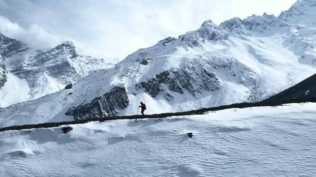 A man ascending the mountains of Nepal