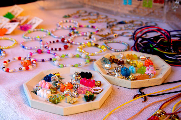 istock handmade hand bracelets made of beads lie on the surface 1498051300