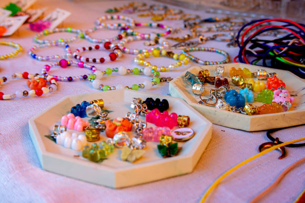 istock handmade bracelets and rings on the hand lie on the surface 1498051469