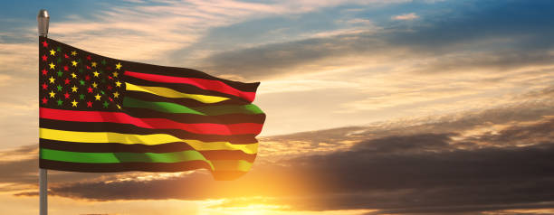 istock Alternative Juneteenth Flag on flagpole with sunrise or sunset. Since 1865. Banner. 1498055371