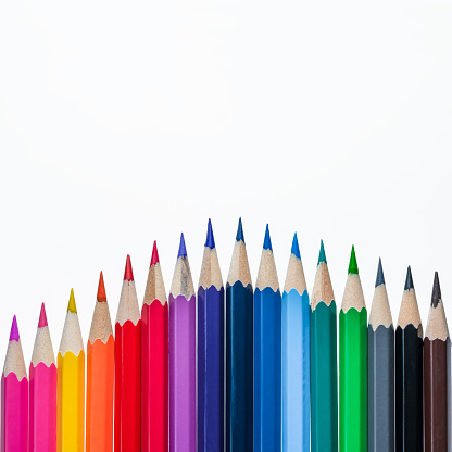 Colored pencils compete with each other in flat style on white.