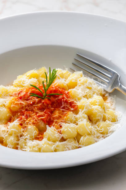 istock gnocchi with tomato sauce and parmesan cheese 1498061076