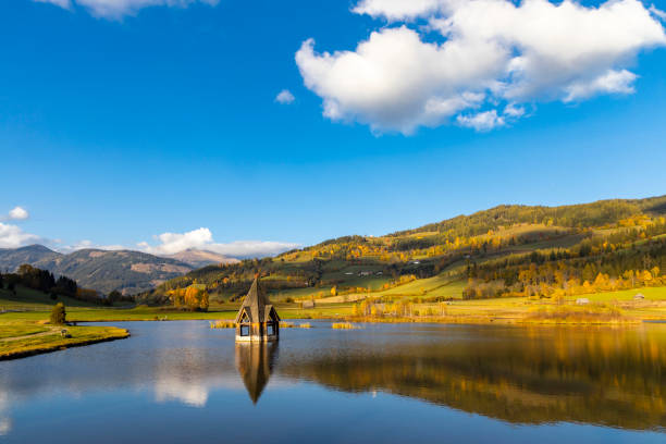 autumn pond under the mountains, Murau district,Styria, Austria
