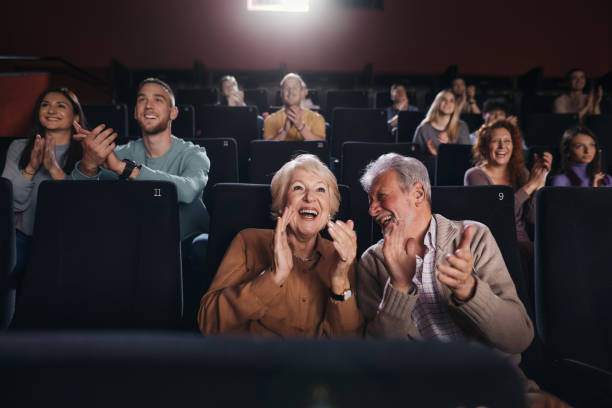 Applauding after movie projection in theatre!
