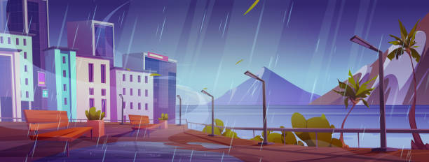istock Rainy city embankment, bench on street near river 1498071853