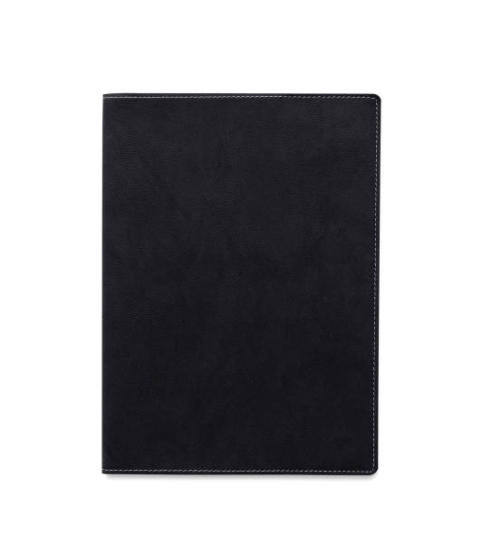 istock Top view closed black leather notebook or diary isolated and white background with clipping path 1498073262