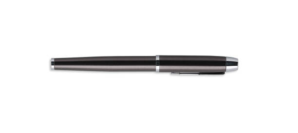 istock Close up black colored ball point pen isolated on white background with clipping path 1498073285
