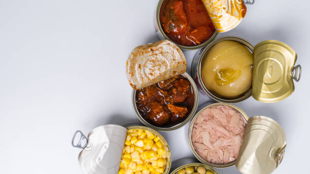 istock Canned food top view photo, Cans with pull-out ring, metal packaging. 1498074081