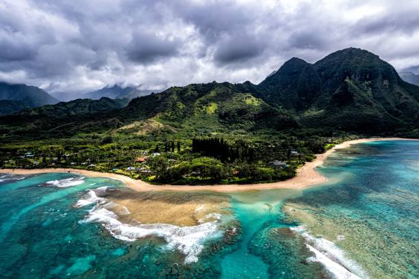 istock Aerial view of mountain landscape surrounded by water 1498080068