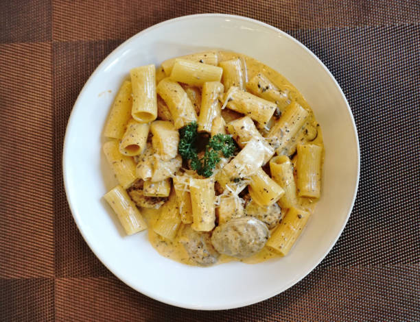 Italian sausage with truffle and mushroom cream sauce