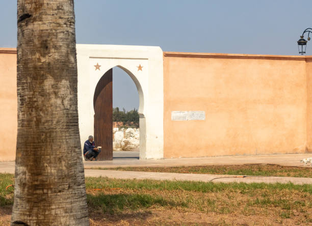 A man outside a Cemetery near Marrakesh in Marrakesh-Safi, Morocco