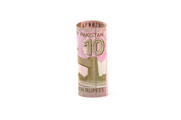 istock Currency notes in Pakistani Rupees - 10 Rupees note isolated n white background. 1498094648