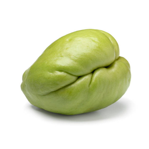Whole single fresh chayote on white background Whole single fresh chayote isolated on white background Christophine stock pictures, royalty-free photos & images