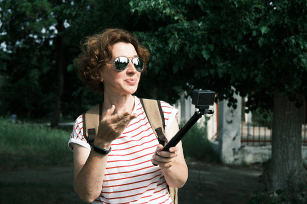 istock Female tourist is streaming in old amusement park 1498095670