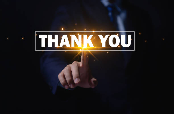 istock businessman showing thank you message 1498097411