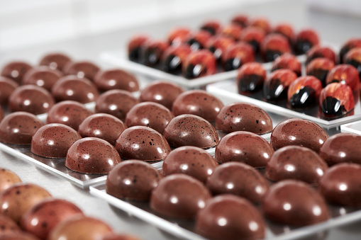 Beautiful confectioner's chocolate eggs in different colors