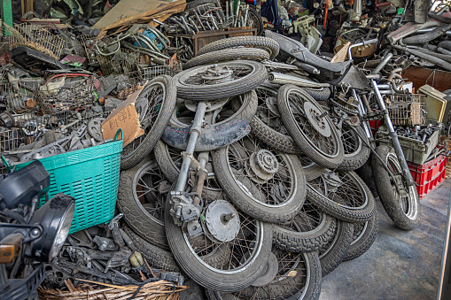 Bangkok, Thailand - March 28th 2023: Shop selling second hand spare-parts to motorcycles and cars in the center of the capital of Thailand