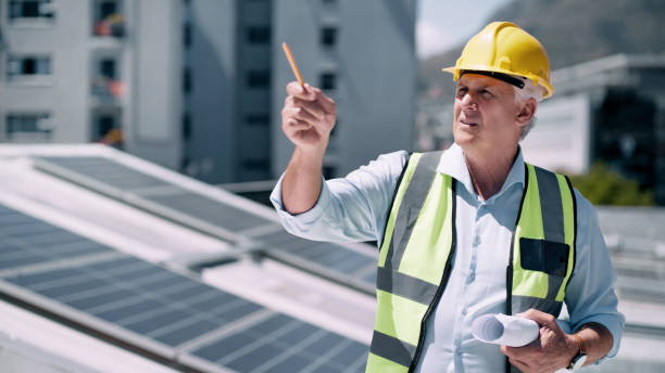 istock Civil engineering, planning and architect man outdoor with blueprint, infrastructure or construction site management inspection. Construction worker manager counting project building progress in zoom 1498098861