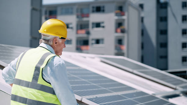 Solar energy, solar panel supervisor and renewable energy electricity technology for sustainability, development and innovation. Clean energy, sustainable construction worker or green tech contractor