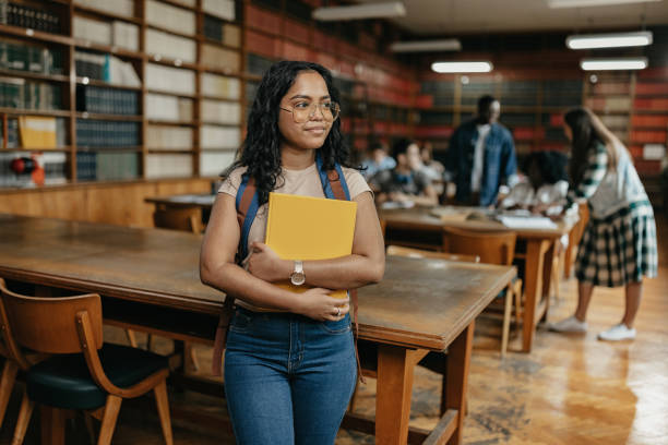 istock Female indian student looking away portrait 1498104831