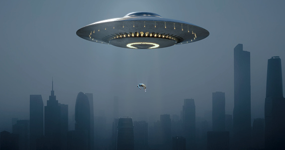 At dusk, a cityscape is bathed in the warm hues of the setting sun. Suddenly, a UFO materializes, hovering ominously above the urban landscape. As the twilight deepens, the unidentified flying object swiftly snatches a person, engulfing them in a beam of light.