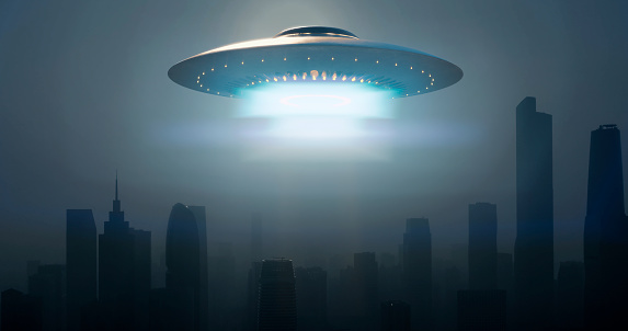 Over the city, shrouded in a mysterious fog, a UFO emerged. Its saucer-like shape glowed with an otherworldly luminescence, casting an ethereal glow through the mist. Silent and swift, it defied the laws of gravity