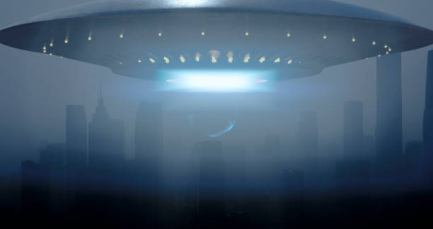 istock A beam of light emerges from an unidentified flying object, enveloping an person 1498106381